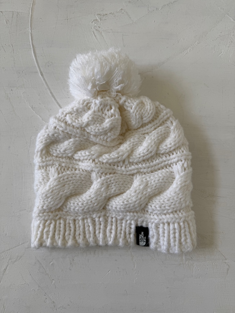 The North Face Cream Cable Knit Pom Beanie